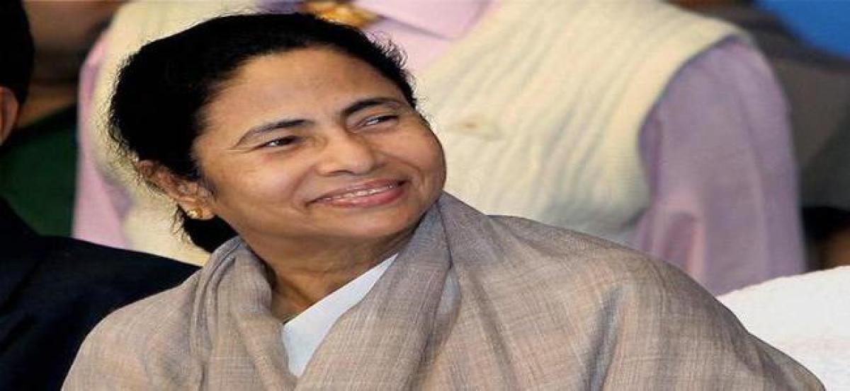 Mamata wishes Manmohan Singh on his bday